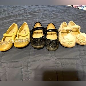 3 pairs Girls size 9 Cherokee dress shoes. Worn but good condition.